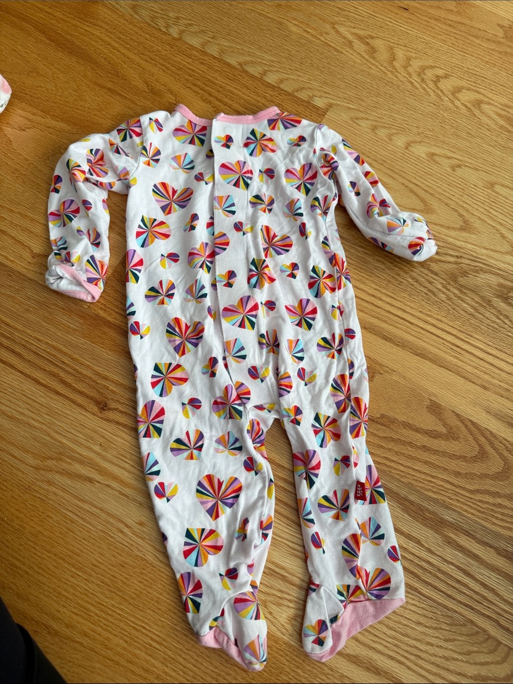 Magnetic Me Pink Trim White Footed One-Piece with Rainbow Heart Print